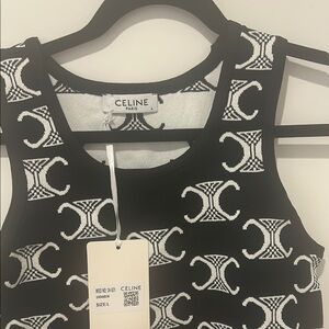 Black fitted sleeveless tank top with scoop neck